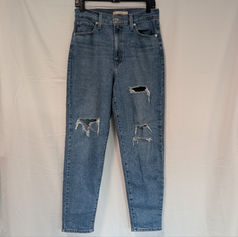 Distressed Blue Jeans